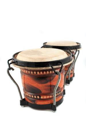 Rhythm percussion instruments bongo drums on a white backgroundの写真素材