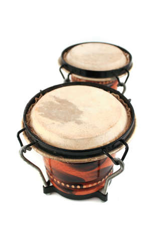 Rhythm percussion instruments bongo drums on a white backgroundの写真素材