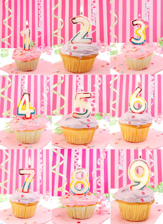 Pink frosted birthday decorated cupcakes with lit candles from 1 to 9の写真素材
