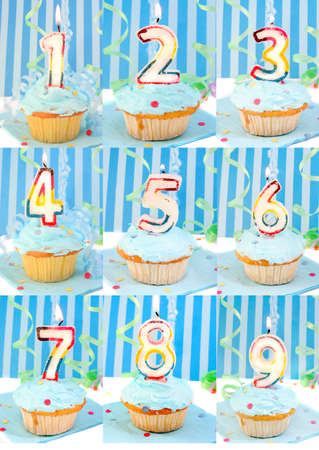 Blue frosted birthday decorated cupcakes with lit candles from 1 to 9の写真素材