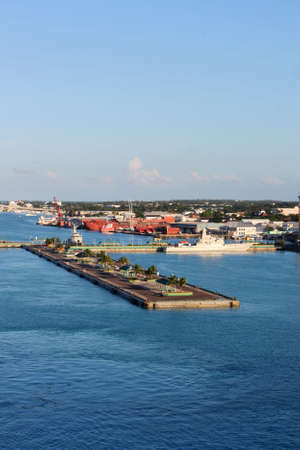 View of the port of Nassau with battleship and cruise ship docks in the forefrontの写真素材
