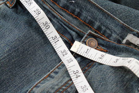 Measuring tape measuring 32 inches which is a healthy waist circumference for women..の写真素材