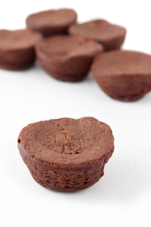 Small chocolate bite sized brownies on white background (not isolated)の写真素材