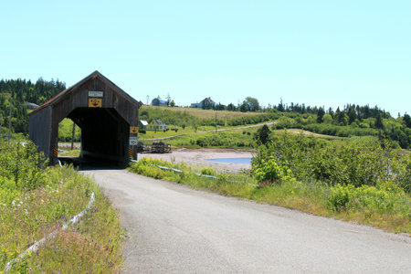 Rustic wooden covered bridge in New Brunswick, Canada