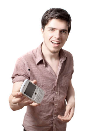 Eighteen year old young man shows you his cellphone on a white backgroundの写真素材