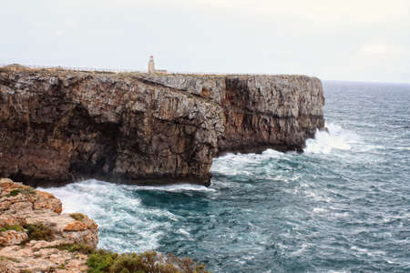 Rugged and rocky cliffs of the Algarve coastline in Sagres, Portugal, on the Atlantic Oceanの写真素材