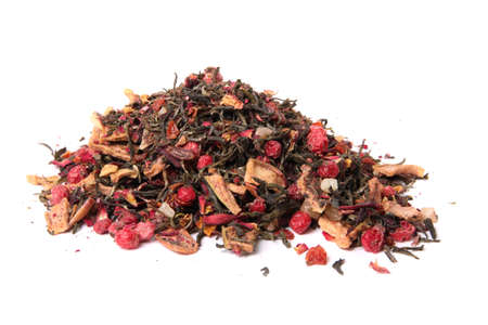 Pile of dried loose berry blossom tea  with leaves ready to steep and brew on a white backgroundの写真素材
