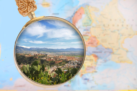 Looking in on Granada, Spain with European map in the background