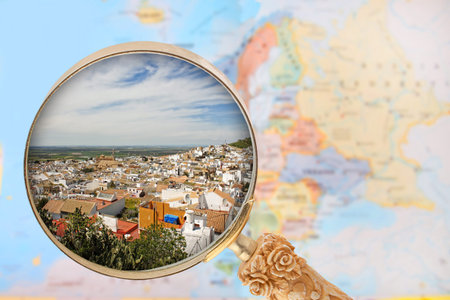 Looking in on Osuna, Spain with European map in the background
