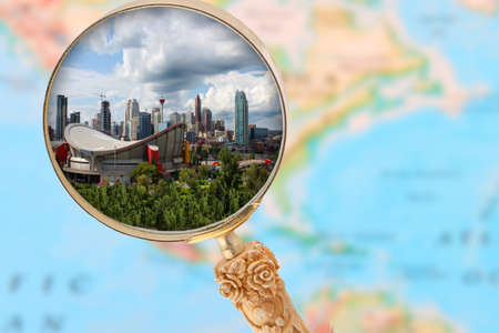 Looking in on Calgary Alberta with blurred map of North America in the backgroundの写真素材
