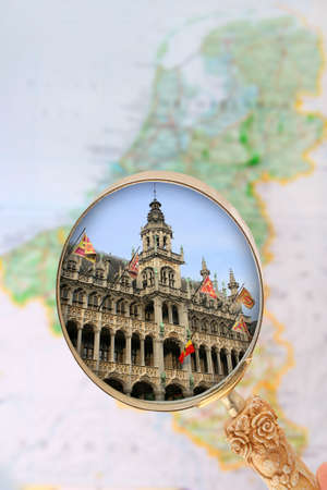 Looking in on Grand Place, Brussels, Belgium with map blurred in the backgroundの写真素材