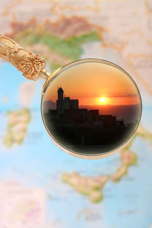 Magnifying glass looking in on Sorrento, Italy at sunsetの写真素材