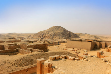 Excavated ruins in Saqqara, Egypt, in the golden sands