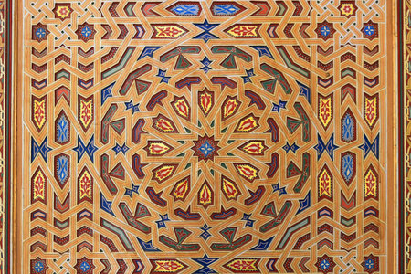 Beautiful door frame work in different shapes and colors in Rissani, Morocco