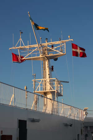 Denmark, Scandinavia -  October 4, 2016: flags on the ferry boat from Frederikshavn, Denmark to Gothenburg, Sweden, Scandinavia.のeditorial素材