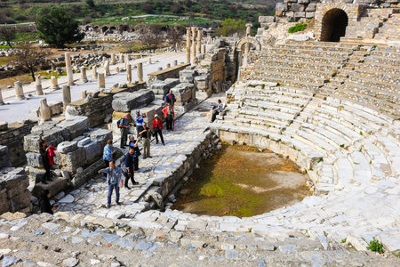 EPHESUS, TURKEY - FEBRUARY 17, 2016: People visiting the Odeion  in Ephesus, Turkey