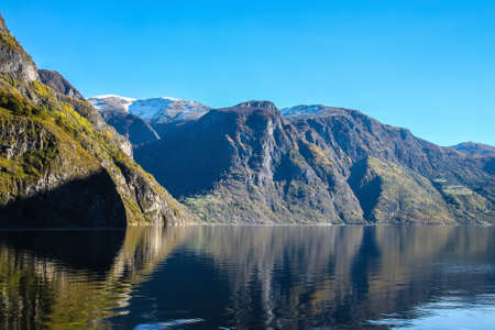 Scenery of water and surrounding mountains  of Sognefjord, Norway, Scandinaviaの写真素材