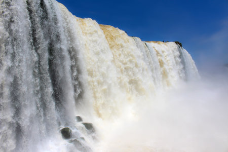 Misty Iguazu Falls or IguaÃ§u Falls are waterfalls of the Iguazu River on the border of the...