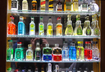 Prague, Czech Republic - 2017-10-17 Different types of liquor like absinthe and whisky on display of a shop window in Pragueのeditorial素材