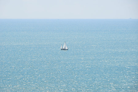 Photo of boat in the sea - filmed from the cliff