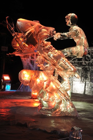 Fairbanks, Alaska, March 9, 2010: Age of the Mechanical Musher Ice Sculpture, 2010 World Ice Art Championshipsのeditorial素材