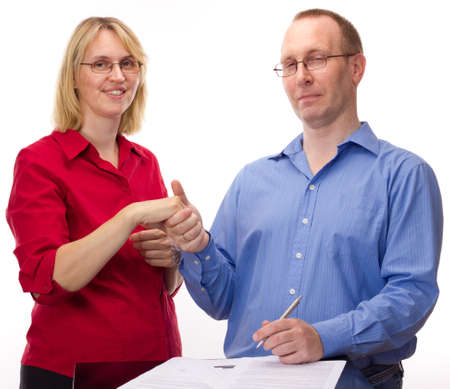 Person signing of an agreementの写真素材
