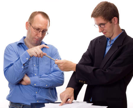 Person signing of an agreementの写真素材