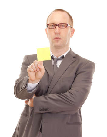 Business person showing removable noteの写真素材