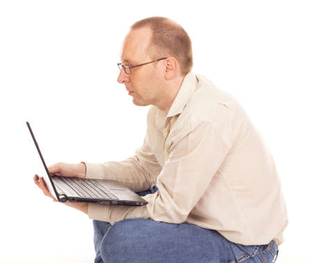 Man working over the internet at homeの写真素材
