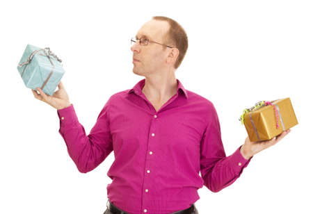 A business person juggling with two colorful giftsの写真素材