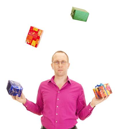 A business person juggling with some colorful giftsの写真素材