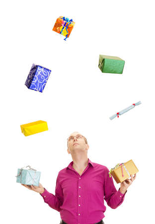 A business person juggling with some colorful giftsの写真素材