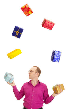 A business person juggling with some colorful giftsの写真素材