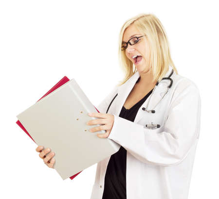Medical doctor with a lot of workの写真素材