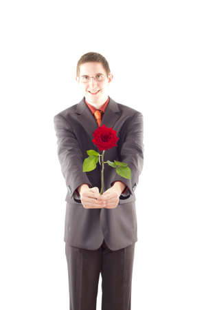 Young man with a roseの写真素材