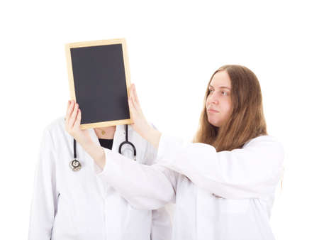Two female medical doctors with blackboardの写真素材