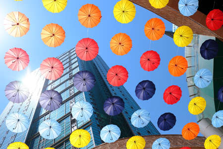 Umbrella decoration under a buildingの写真素材