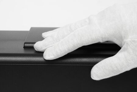 gloves on black plastic, special care in production, top quality madeの写真素材