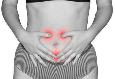 Pain in a woman bellyの写真素材