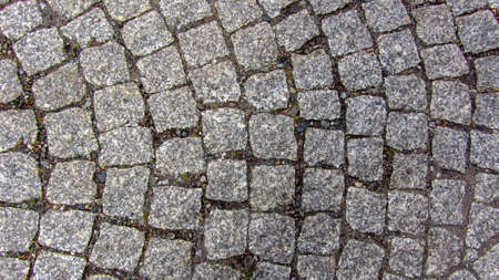 Paving stones on the pavement in the old town.の写真素材
