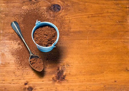 Cocoa powder on wooden backgroundの写真素材