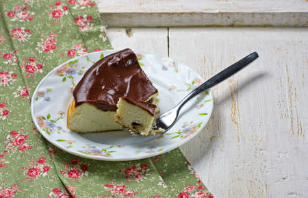 Piece of cheese casserole with chocolate glazeの写真素材