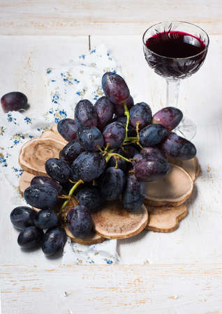 black grapes and red wine. close upの写真素材