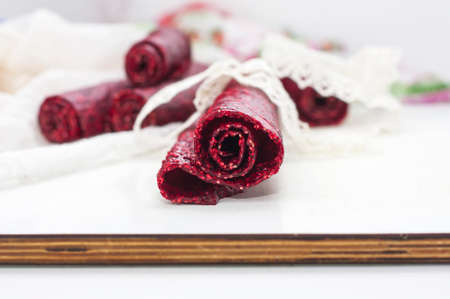 Fruit leather rolls, closeup shot, local focus.の写真素材