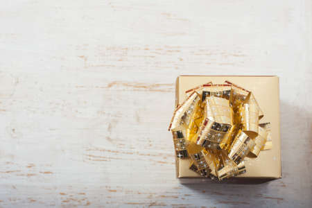 gold gift box on white table. selective focusの写真素材
