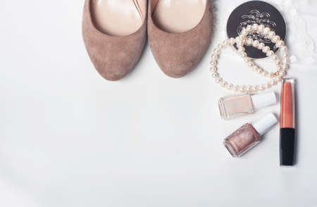Set of women's  accessories and cosmetics on white background. Space for text.の写真素材