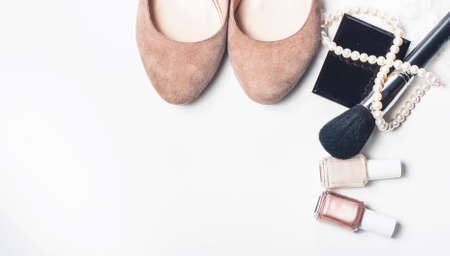 Set of women's  accessories and cosmetics on white background. Space for text.の写真素材