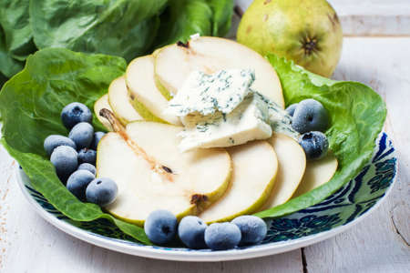 Pear with gorgonzola. Selelective focusの写真素材