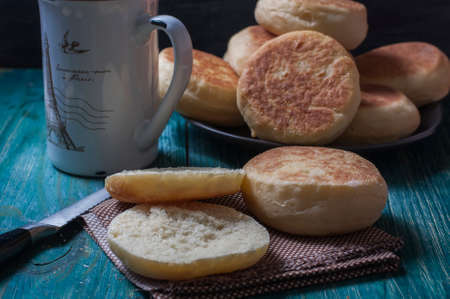 Fresh homemade English muffins with butter. Breakfast. Selective focusの写真素材