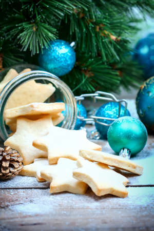Glass jar Christmas cookies in the form of stars. Selective focusの写真素材